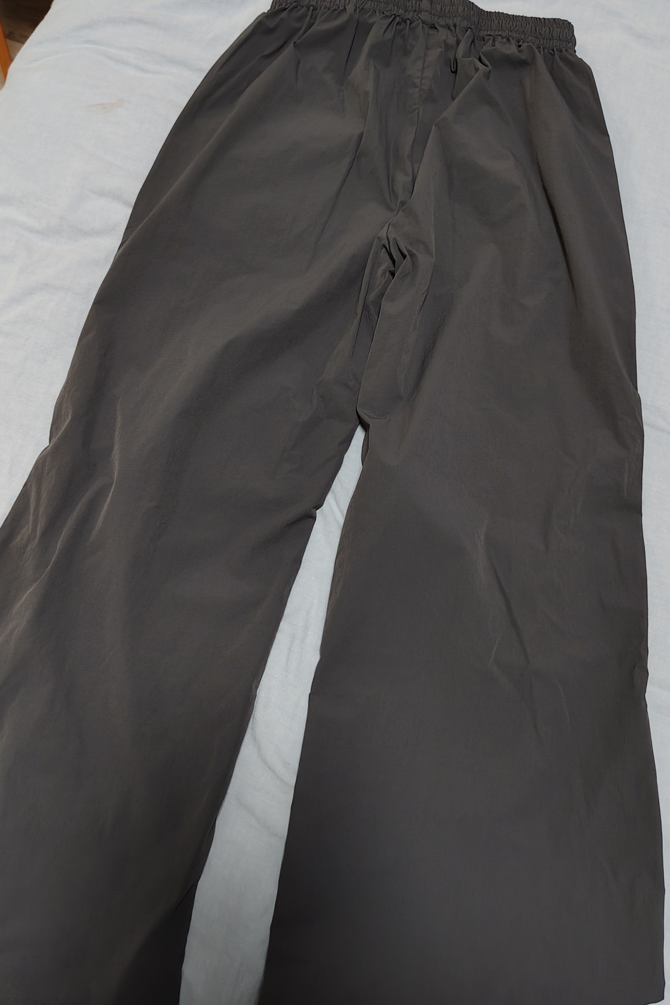 诺帝卡（NAUTICA）【凉感防晒抗湿】NAUTICA童装男女童夏季长裤伞裤速干裤薄运动裤 深灰色 150 实拍图