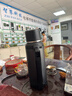 苏泊尔（SUPOR）保温壶大容量不锈钢72小时户外保冷旅行壶暖水壶便携车载热水瓶 儒雅黑2L约4斤水【升级316L不锈钢+背带】 实拍图
