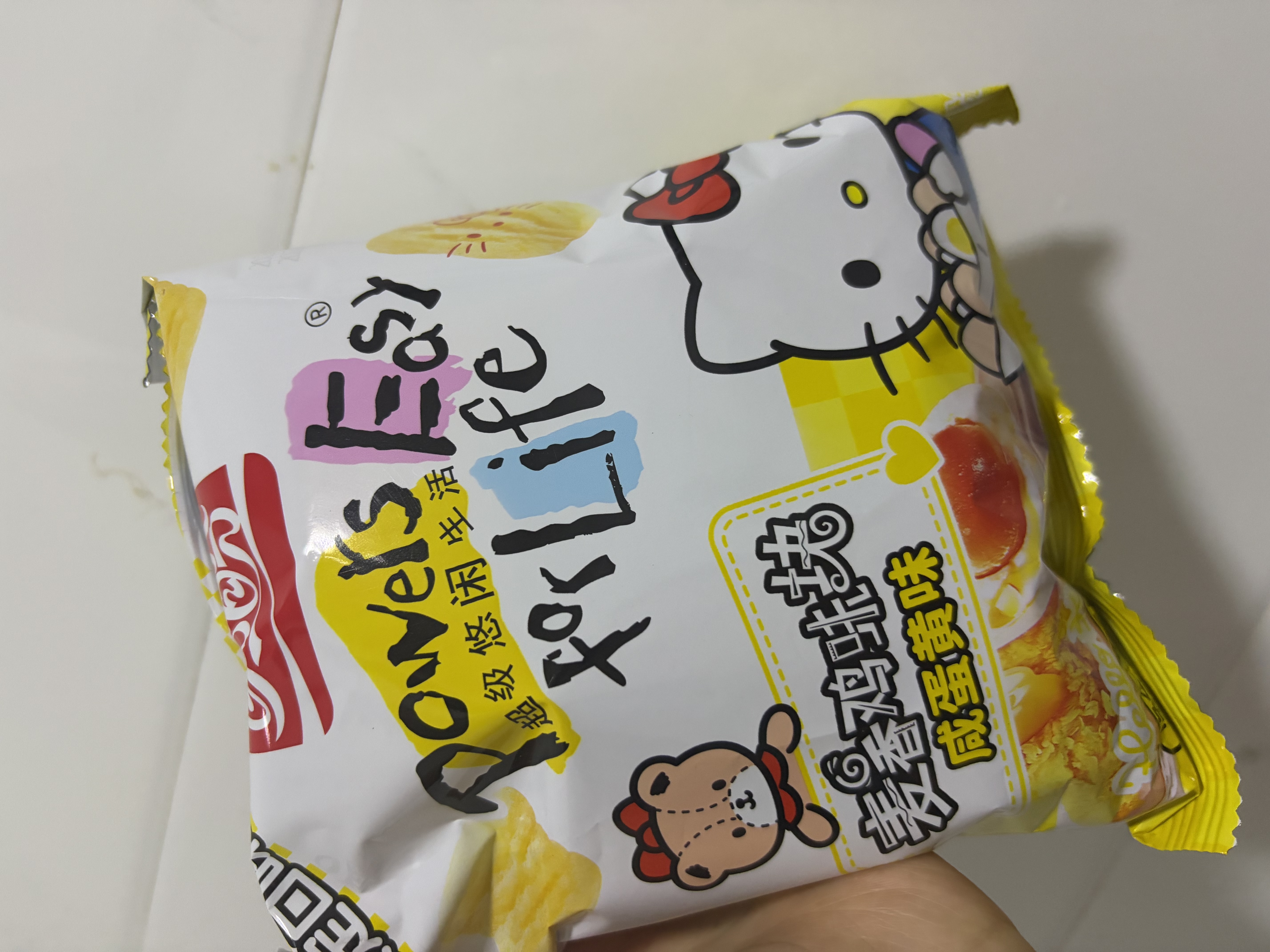盼盼Hello-kitty麦香鸡味块 膨化食品童年多口味办公室解馋休闲小零食 咸蛋黄鸡味块（咸蛋黄味）55g 实拍图