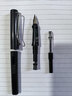 晨光（M&G）文具0.5mmF明尖钢笔 带吸墨器（不含墨囊）可换墨囊适配3.4口径 学生书法写字 黑杆单支AFPY5222 实拍图