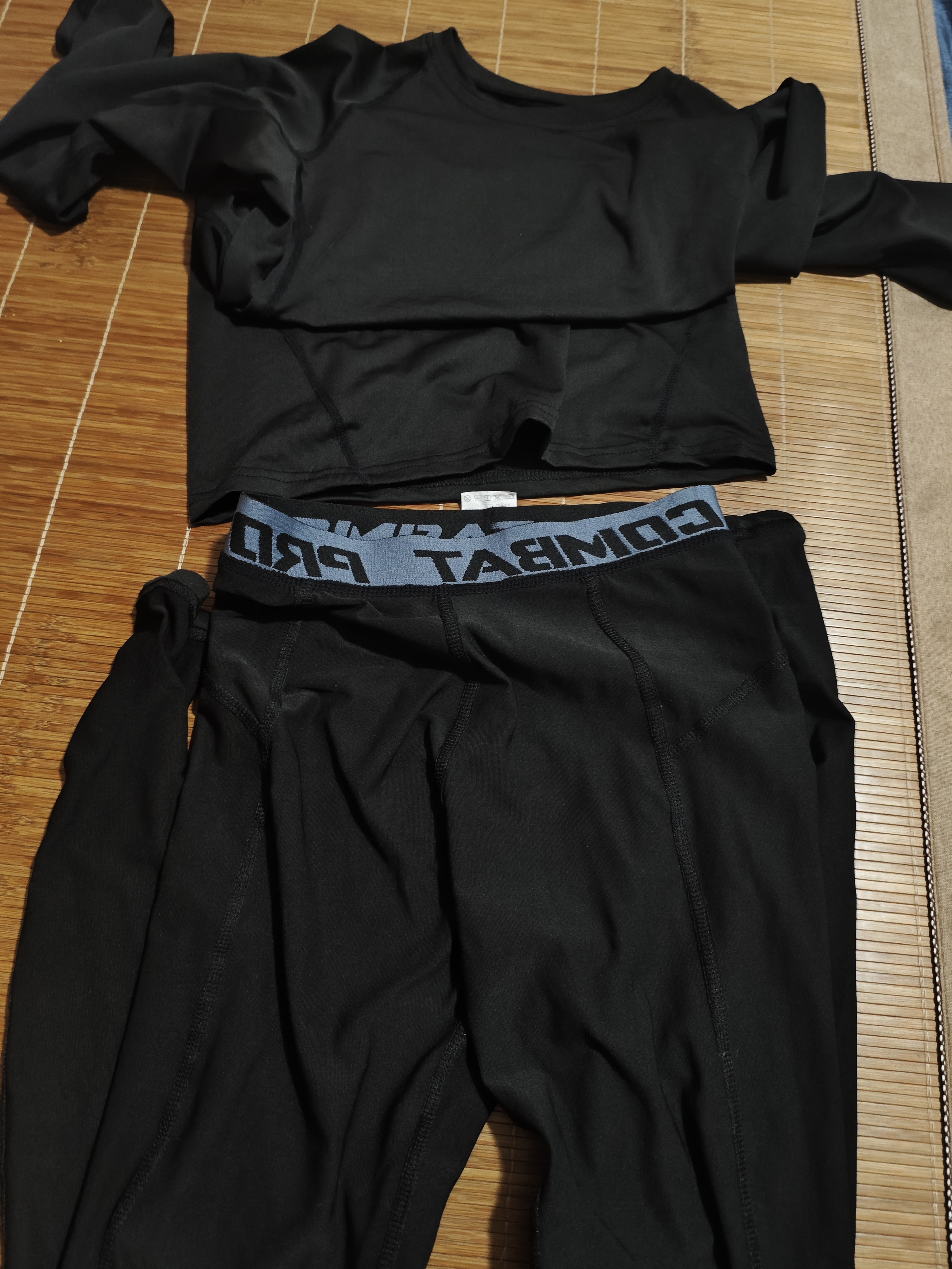 昇亿 儿童紧身衣训练服运动套装健身速干衣弹力保暖足球训练篮球服 【长袖】全黑两件套 140 （28码 适合60-70斤） 实拍图