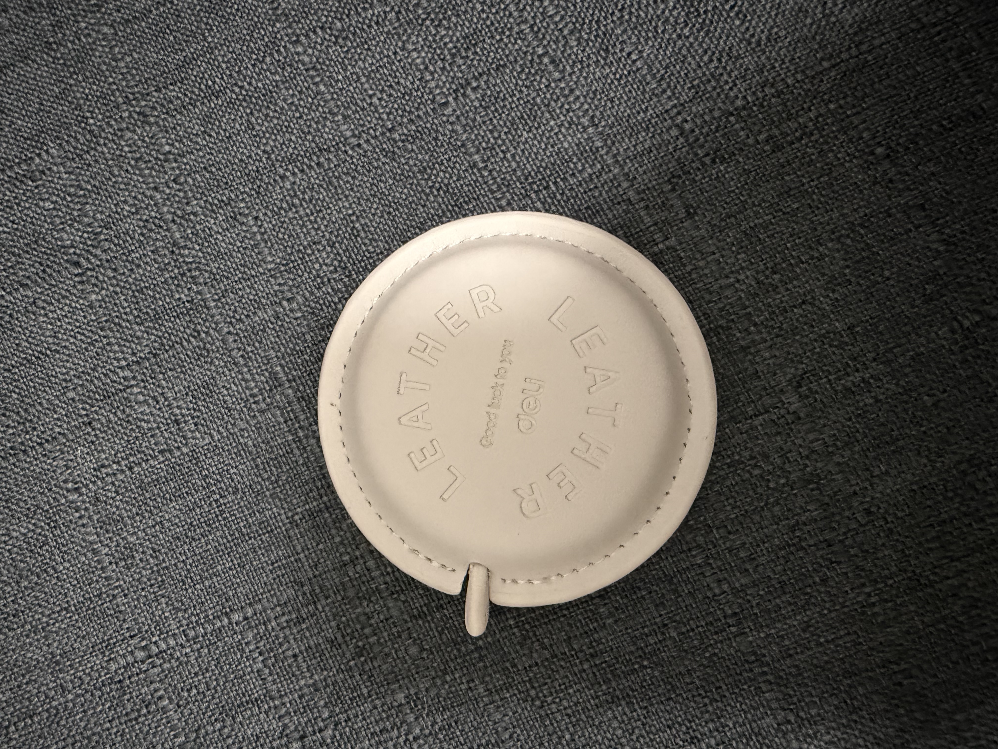 得力（deli）【得力高档新品】2m皮质迷你皮卷尺 可伸缩便携量衣皮卷尺 测量身高/三围/腰围 TT112白 实拍图