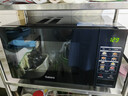 格兰仕（Galanz）变频微波炉烤箱一体机光波炉900瓦大功率速热家用23L大容量平板易清洁省电一级能效智能菜单烧烤 2026新升级彩膜BM1(S2) 实拍图