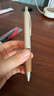 uni三菱按动中性笔 橡木笔握商务学生办公签字笔UMN-515（替芯UMR-85N）0.5mm 粗杆深木色 黑芯 实拍图