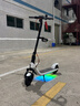 九号（Ninebot）电动滑板车E2Plus白色升级款 成年人减震折叠氛围灯电动车两轮代步智能学生便携式大屏仪表 实拍图