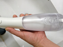 博皓（prooral）冲牙器F48手持立式洗牙器带数显水牙线成人洁牙器无级调速换挡丝滑便携牙齿冲洗器 白色 300ml 实拍图