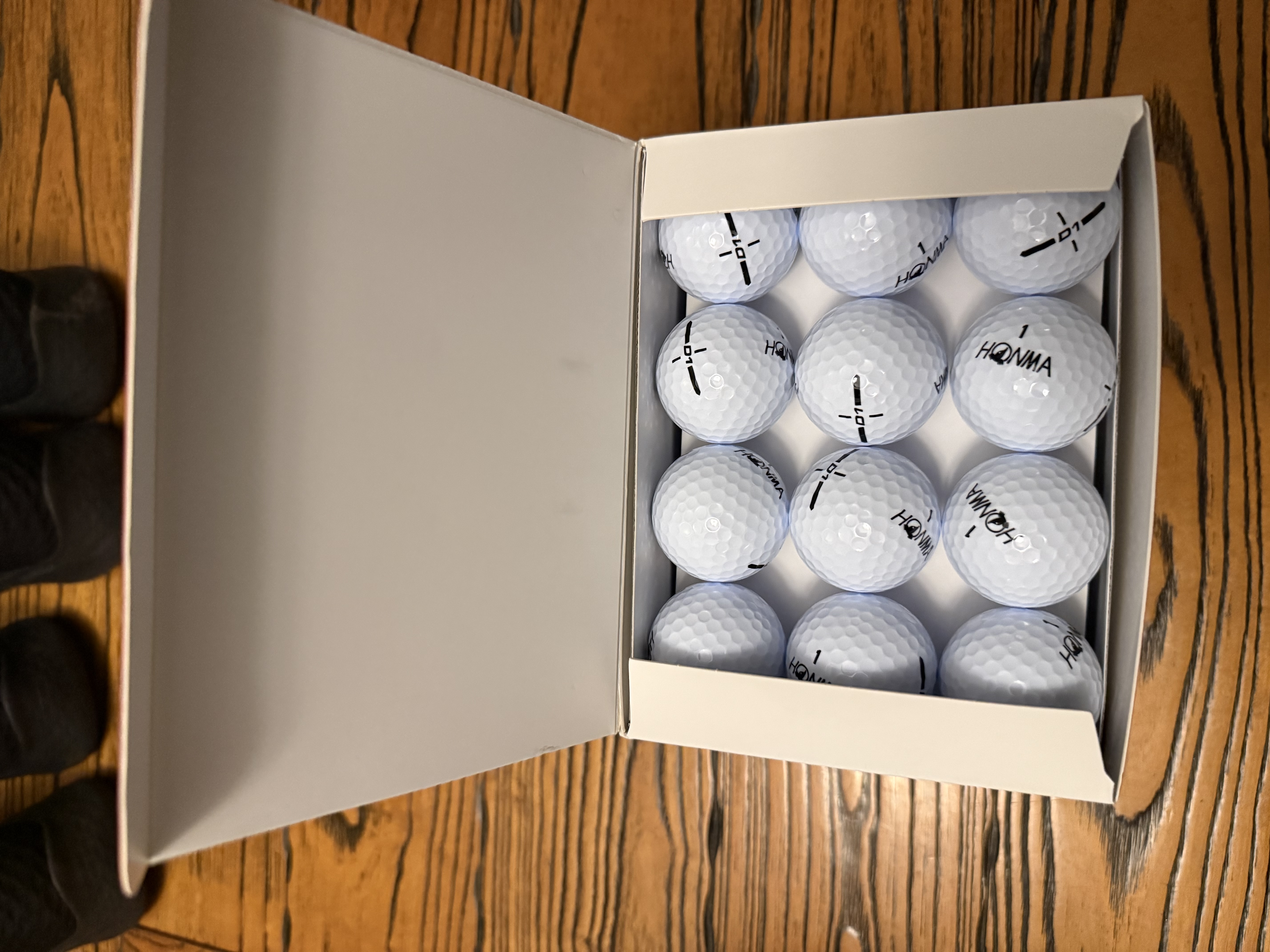 HONMA D1口粮球 高尔夫球 二层球白色 下场比赛练习球远距 48颗/盒 实拍图