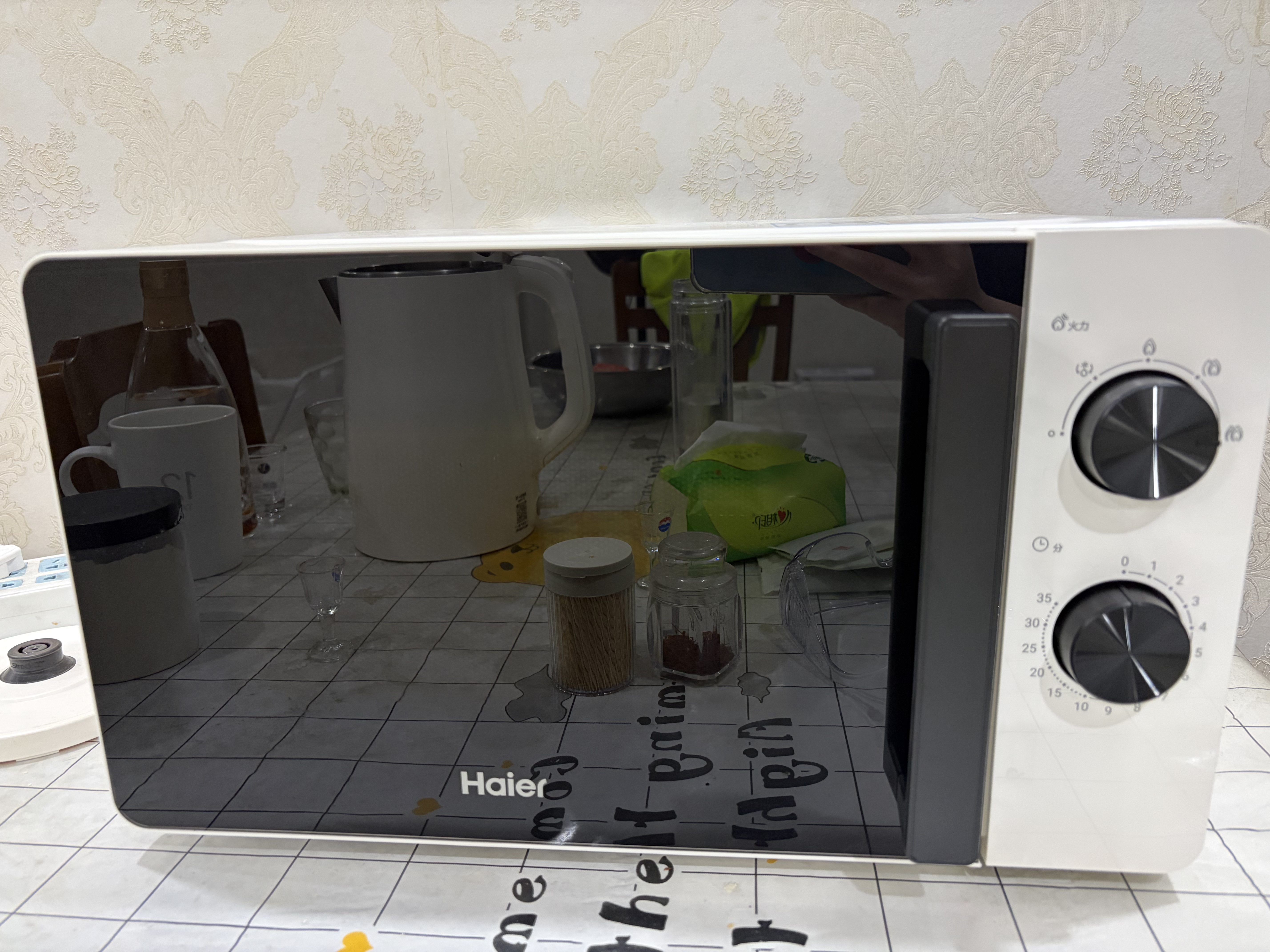 海尔（Haier）0涂层不锈钢快捷微波炉 360°转盘加热 旋转操作易洁内胆 家用小型 老人适用 HW-M2003JW 厨房电器 实拍图