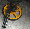 得力（deli）轮式测距仪双折叠机械测距轮尺手推式滚尺测量工具318mm大轮 实拍图