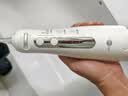 博皓（prooral）冲牙器F48手持立式洗牙器带数显水牙线成人洁牙器无级调速换挡丝滑便携牙齿冲洗器 白色 300ml 实拍图