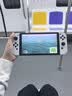Nintendo Switch任天堂  游戏机 Switch NS港版OLED版游戏主机 配白色Joy-Con 便携游戏掌机 实拍图