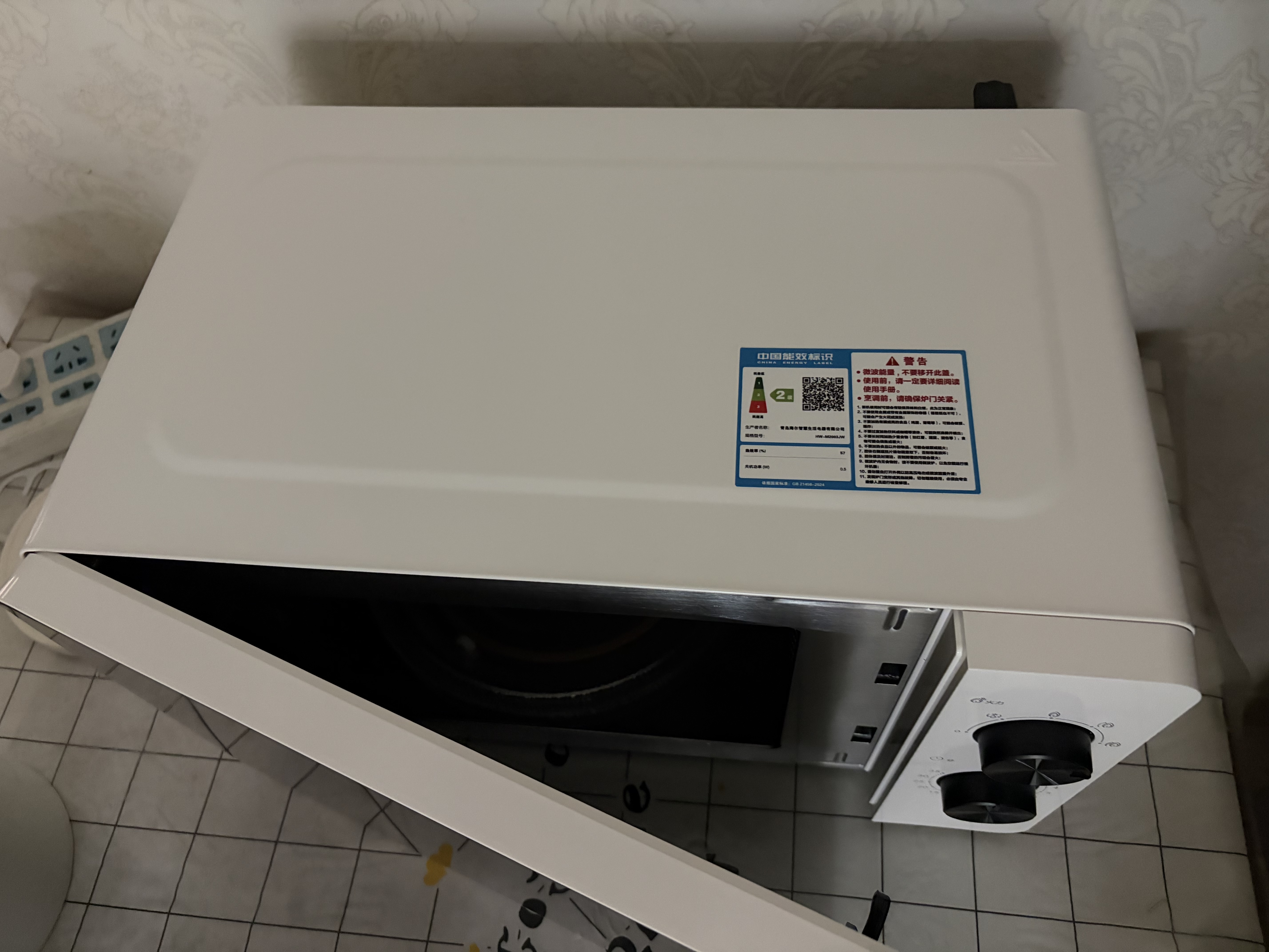 海尔（Haier）0涂层不锈钢快捷微波炉 360°转盘加热 旋转操作易洁内胆 家用小型 老人适用 HW-M2003JW 厨房电器 实拍图