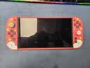 任天堂（Nintendo）【国内保税仓】Switch2/1代 OLED/续航加强日版/港版便携家用ns体感游戏机掌机 新加坡版switch2赛车同捆+塞尔达荒野之息 实拍图