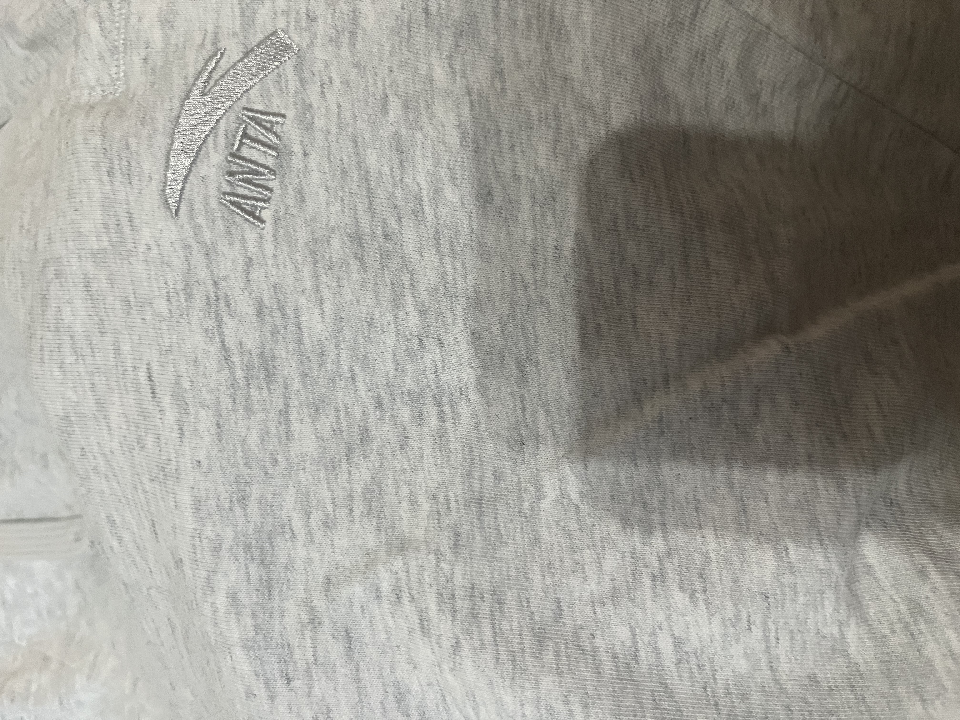 安踏（ANTA）快干棉短裤 | 运动裤男女夏季冰丝凉感五分裤情侣款休闲裤健身裤 【快干棉】CD13灰花灰-1 抗皱易打理 M 男170/女165 实拍图