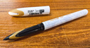 uni三菱uni-ballAIR黑科技黑色中性笔0.5签字笔商务直液式水笔刷题笔 白金UBA-188M 12支 实拍图