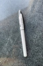 uni三菱【热门商品】 黑科技黑色中性笔0.5黑笔签字笔商务直液式学生水性笔 UBA-188C 灰白色杆1支 实拍图