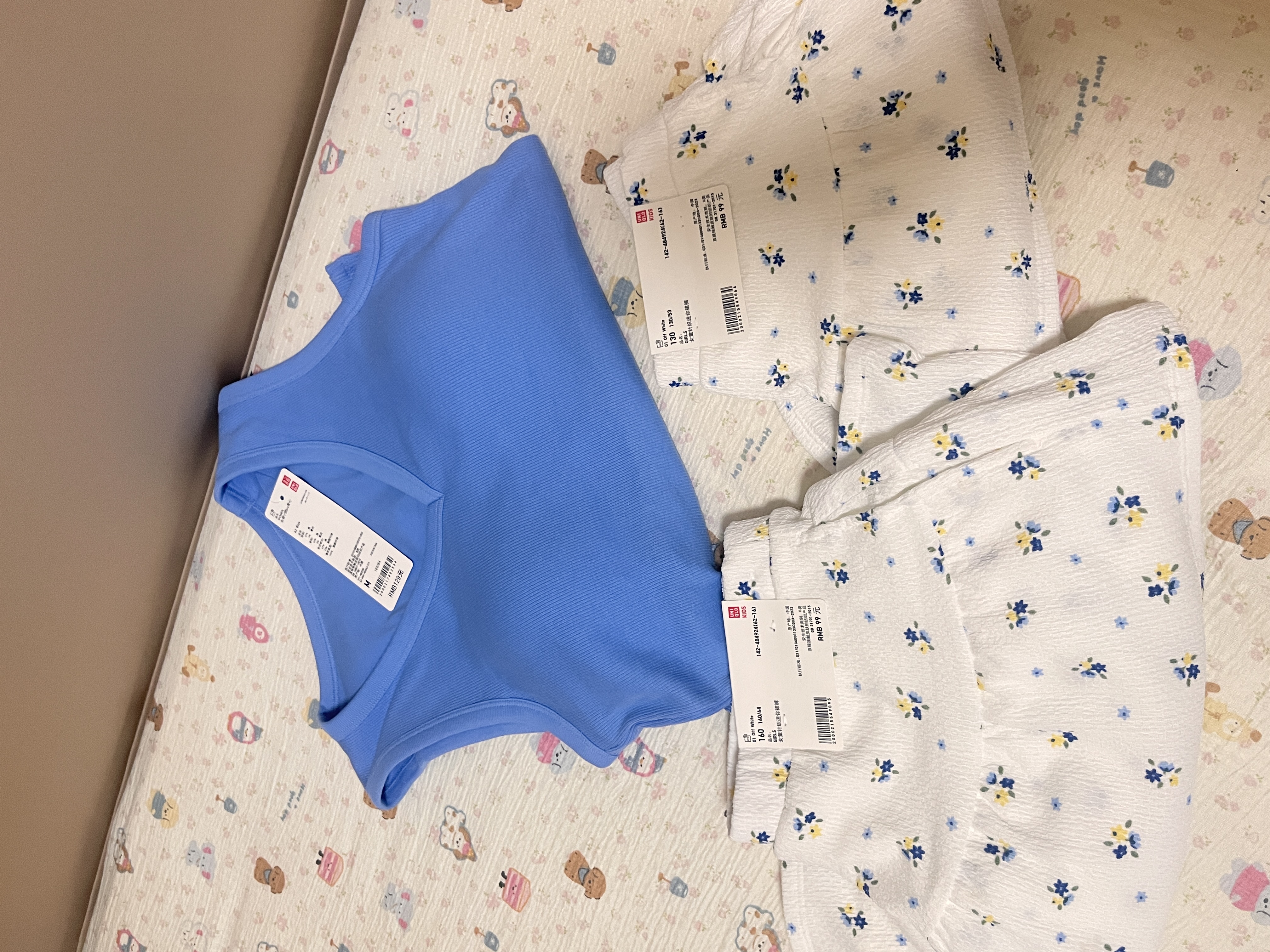 优衣库童装女童针织迷你裙裤短裙短裤半裙484924 01 乳白色 130 实拍图