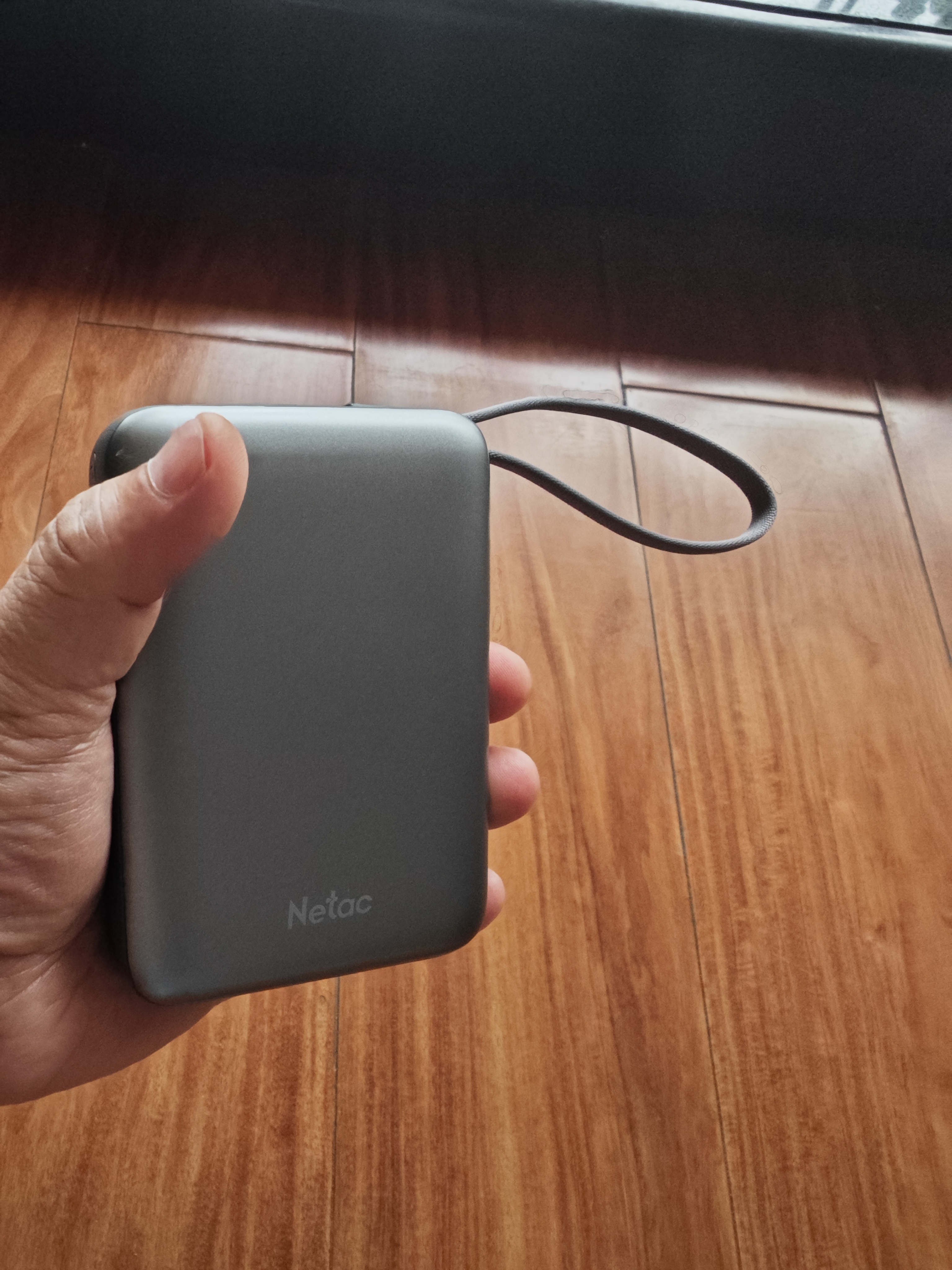 朗科（Netac）3C认证可上飞机iPhone16/17充电宝自带线20000毫安45W快充大容量移动电源适用苹果华为荣耀笔记本 实拍图
