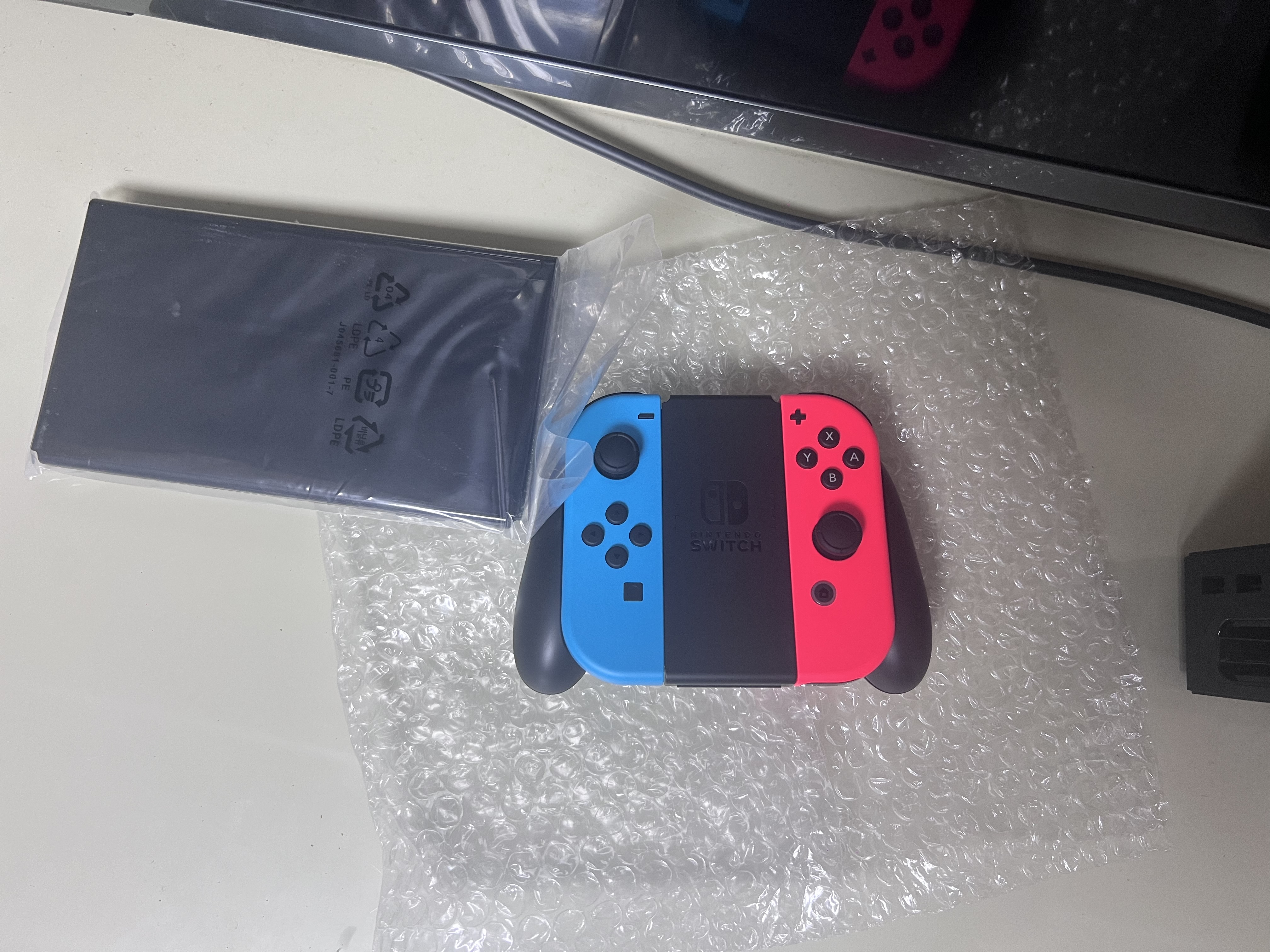 任天堂（Nintendo）【国内保税仓】Switch2/1代 OLED/续航加强日版/港版便携家用ns体感游戏机掌机 港版OLED红蓝+塞尔达荒野之息(保税仓） 实拍图
