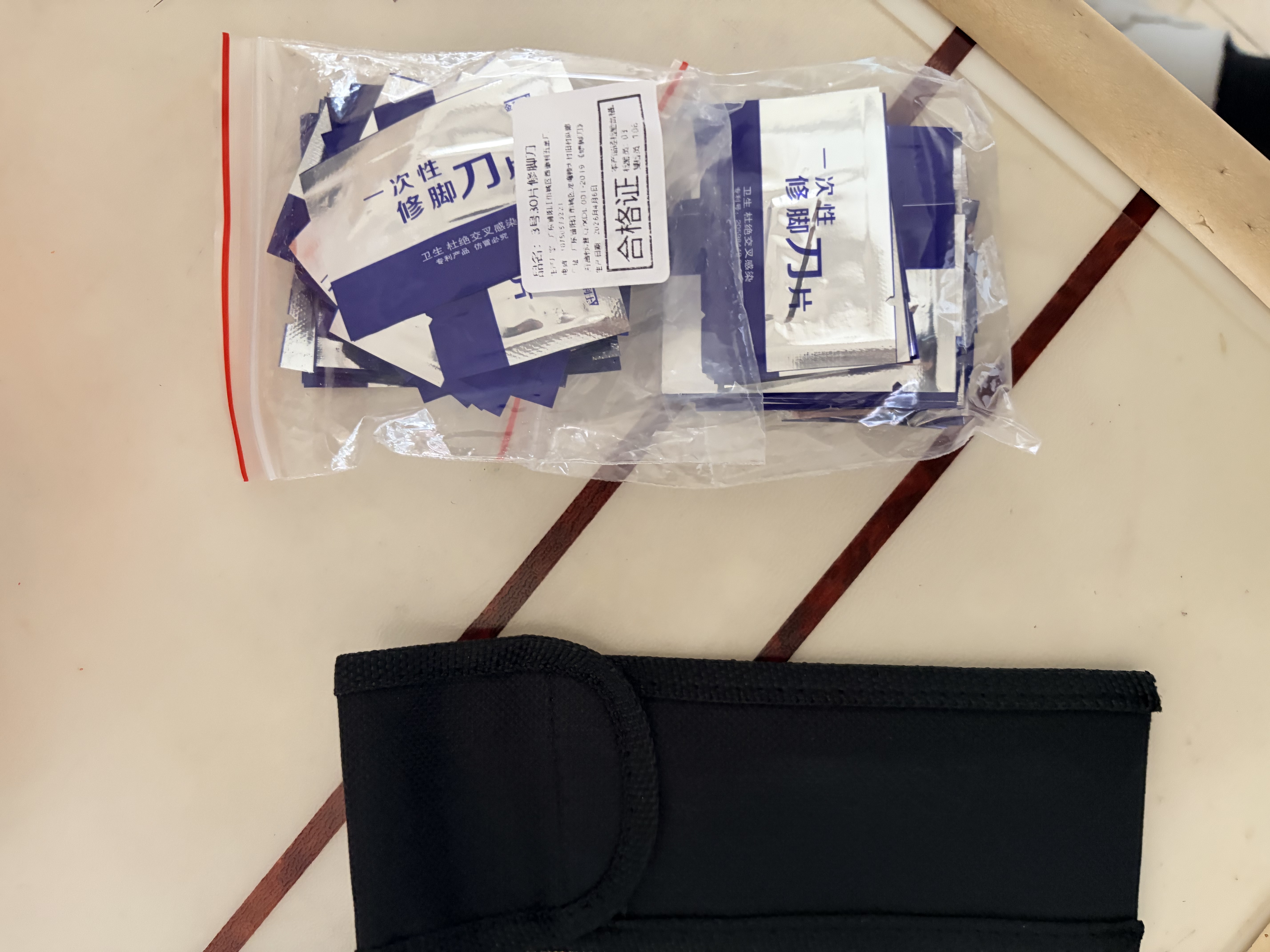DOCLINS 一次性修脚刀片刀架套装可替换刀柄足浴店专业修脚刀去死皮扬州三把刀 小刀架+30片5号刀片 实拍图