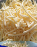 妙可蓝多马苏里拉芝士碎450g*2 奶酪碎 焗饭披萨拉丝烘焙原料 实拍图