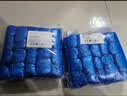 SHUANG YU一次性鞋套100只装 防尘防水PE脚套加厚塑料鞋套室内户外家用鞋套 实拍图