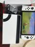 任天堂（Nintendo）【国内保税仓】Switch2/1代 OLED/续航加强日版/港版便携家用ns体感游戏机掌机 日版OLED白色+荒野之息+奥德赛 实拍图