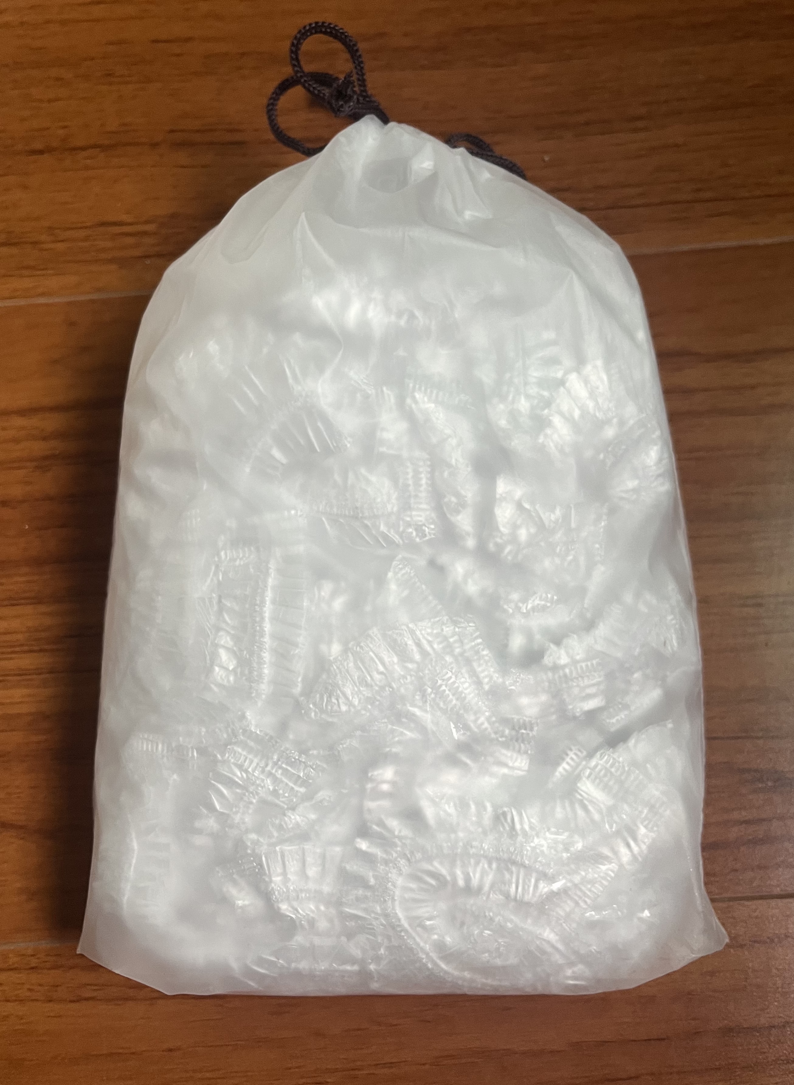 优家（UPLUS）一次性浴帽【加厚100只】 多功能防水洗澡帽头套护发帽 实拍图