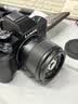 松下（Panasonic）Lumix G100D M43画幅相机 M43卡口 微单相机 无反数码相机 G100D单机+【25mmF1.7】单镜头定焦 实拍图