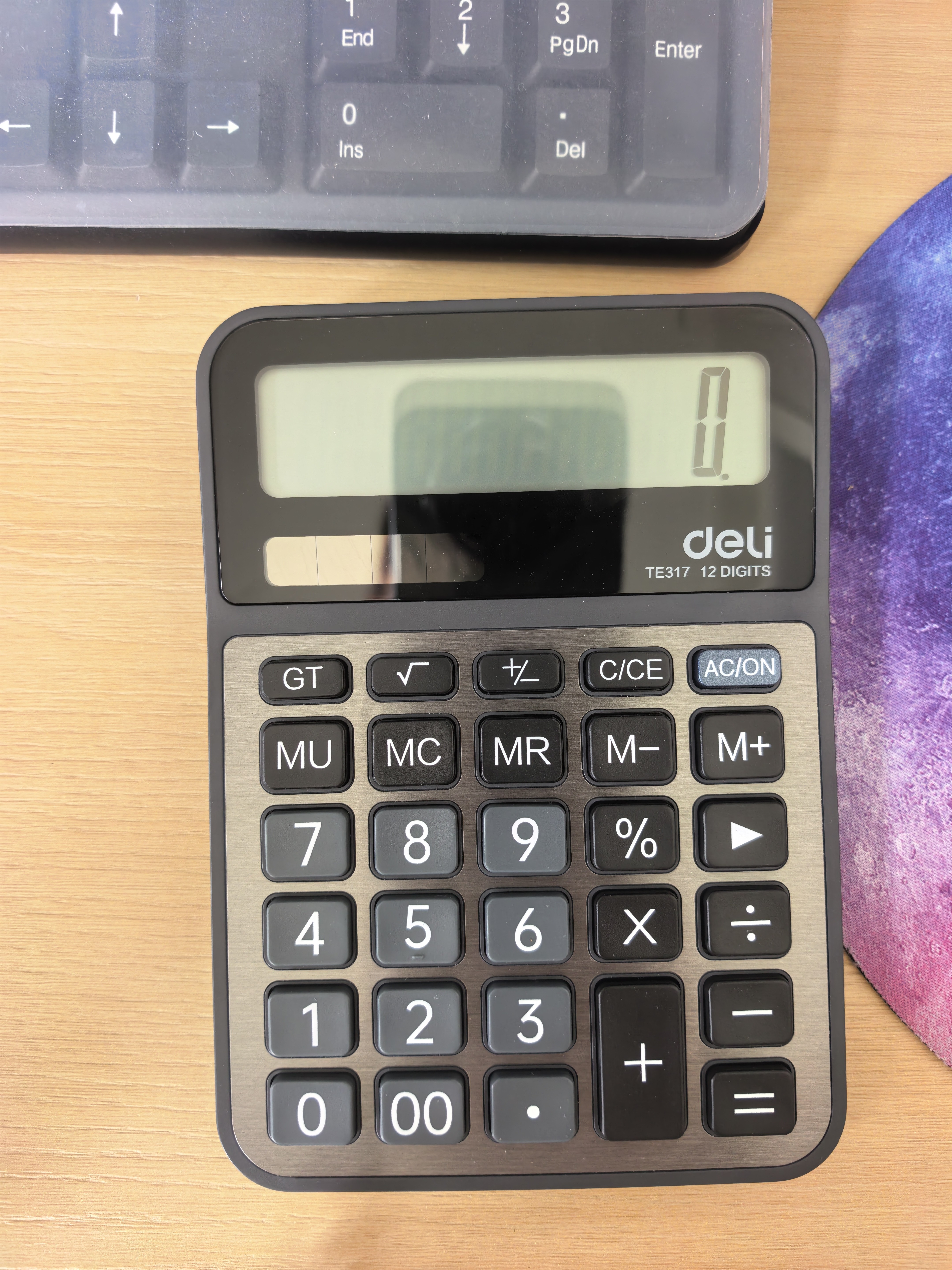 得力（deli）计算器双电源宽屏金属面板计算器办公桌面无语音计算器 金融财务计算机 办公文具学习用品 TE317 实拍图