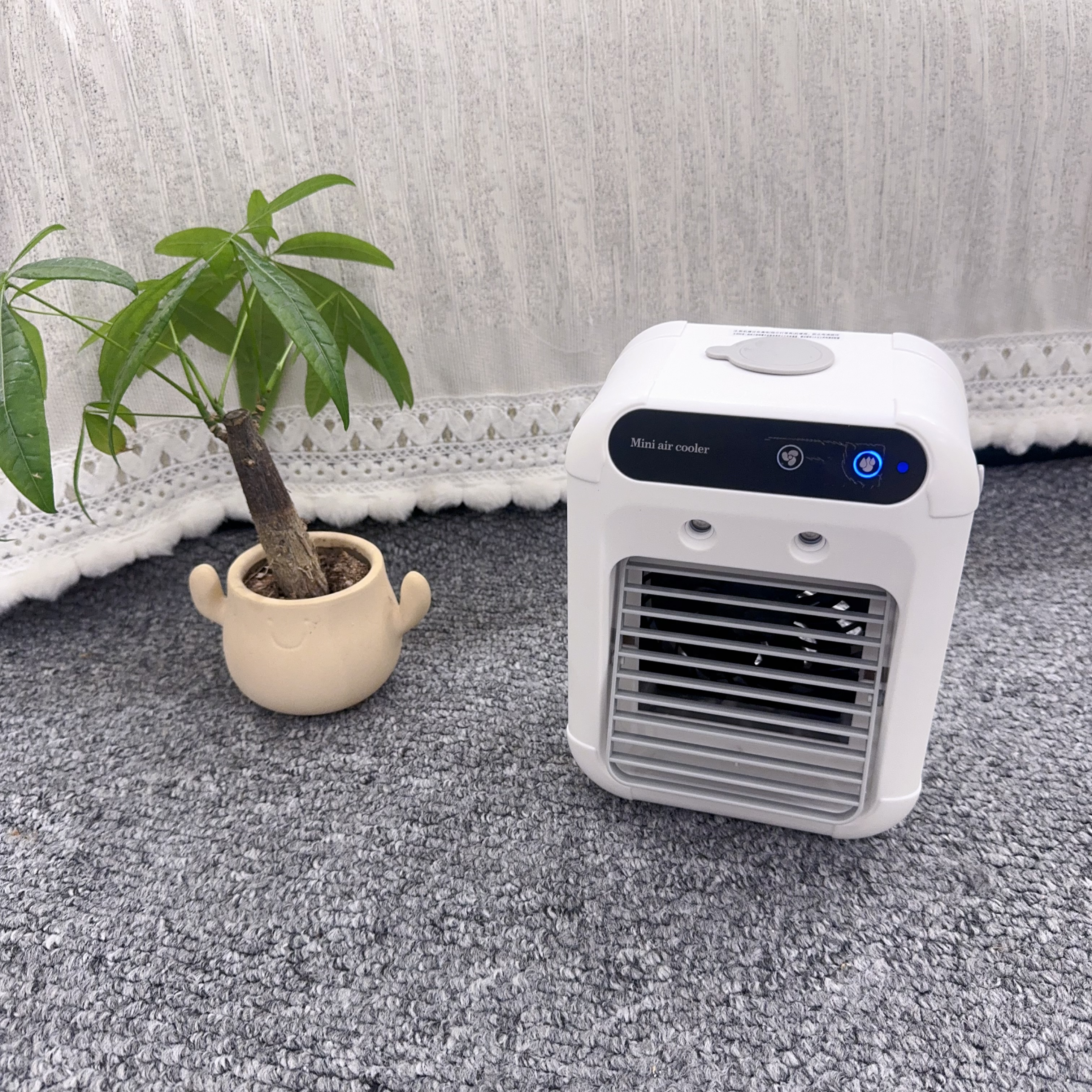 德烁便携式USB充电移动小空调桌面风扇制冷小型喷雾大风力水冷风扇宿舍床上卧室户外加冰块加水冷风机 手提便携+充电式+水冷降温+角度可调 实拍图