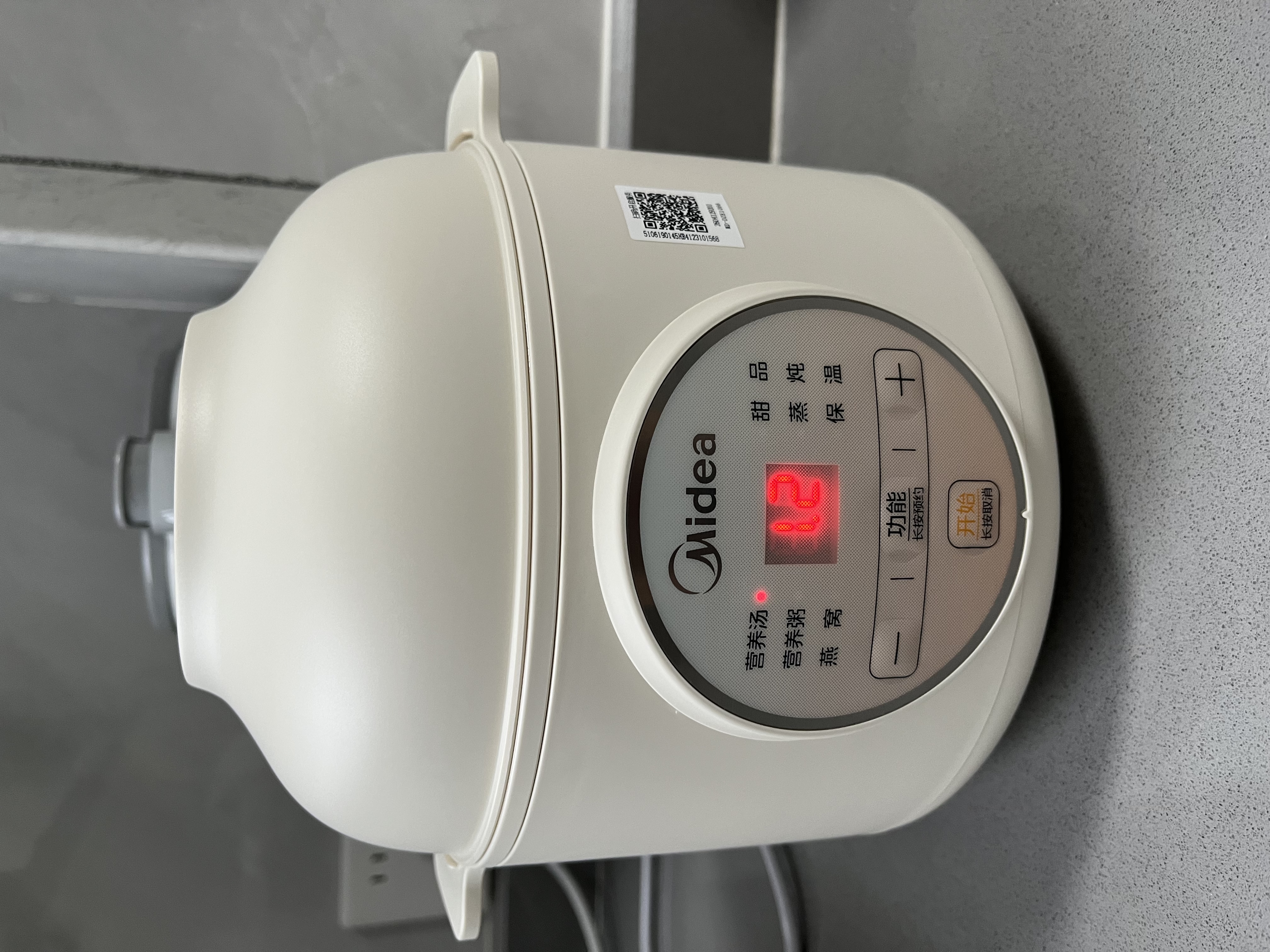 美的（Midea）电炖锅 隔水炖煲汤锅 多功能电砂锅 白瓷内胆 防干烧迷你电炖盅 bb煲 婴儿辅食锅陶瓷炖盅蒸炖锅 【 防烫把手】DZE1066  1L 实拍图