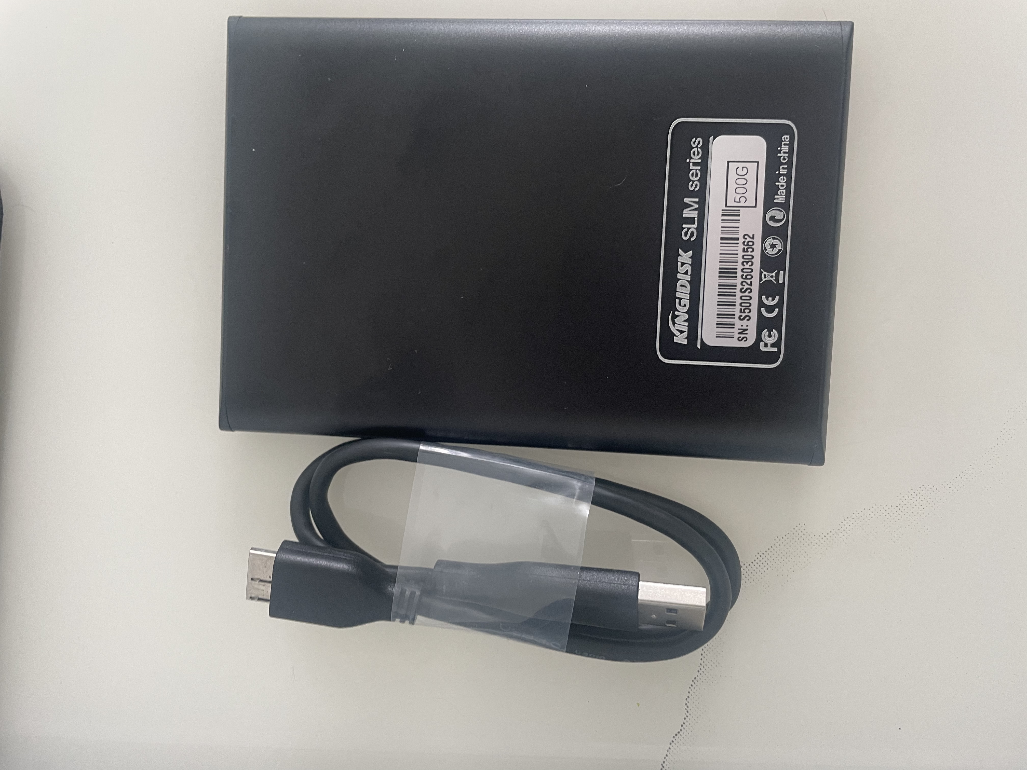 黑甲虫 (KINGIDISK) 500G USB3.0 移动硬盘 SLIM系列 2.5英寸 子夜黑 9.5mm金属纤薄 抗震抗压 SLIM500 实拍图