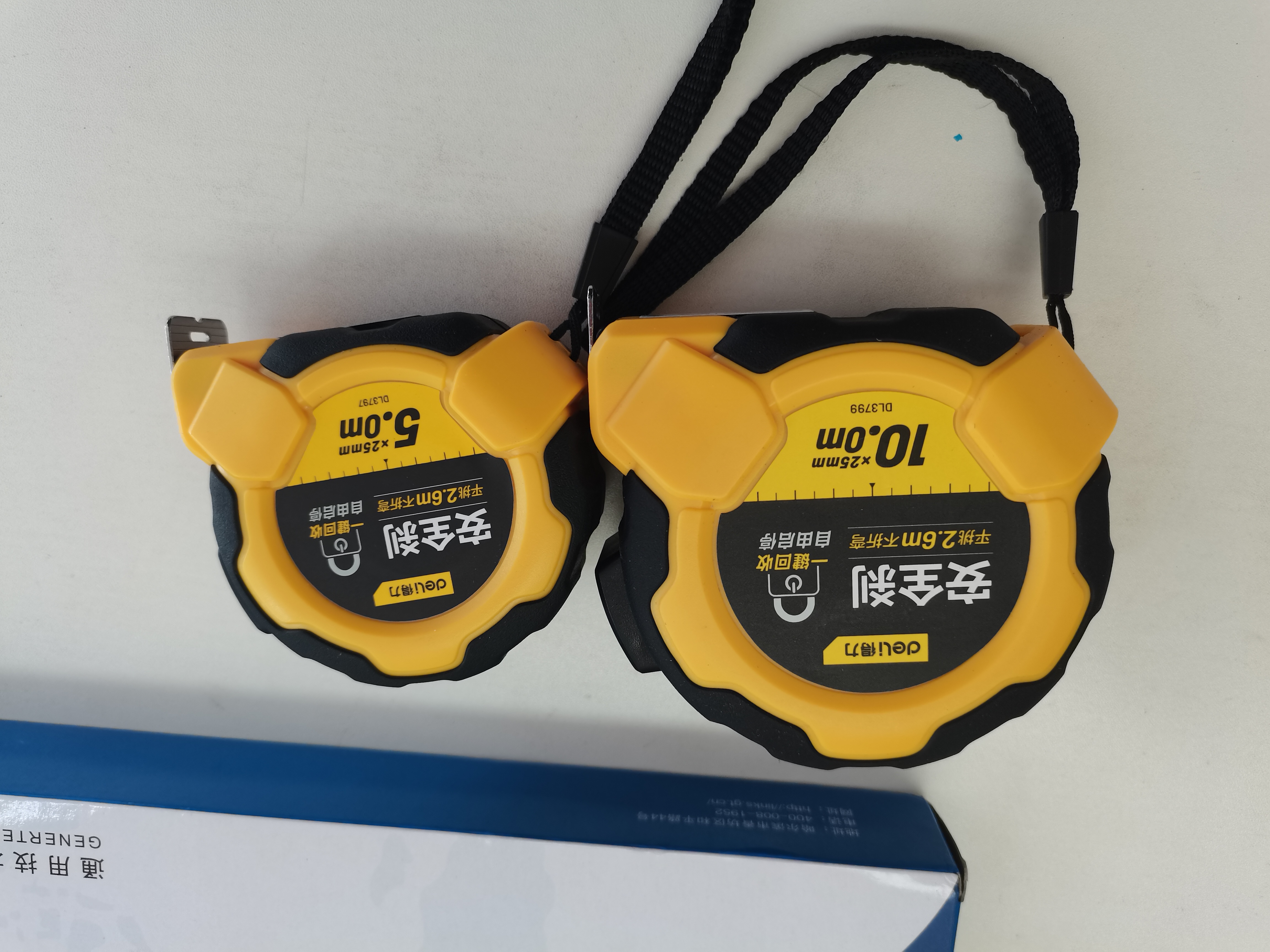 得力（deli）卷尺钢卷尺包胶自锁盒尺伸缩尺米尺工地卷尺防割手木工尺10米 实拍图