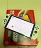Nintendo Switch任天堂  游戏机 Switch NS港版OLED版游戏主机 配白色Joy-Con 便携游戏掌机 实拍图