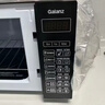 格兰仕（Galanz）微波炉烤箱一体机光波20L家用700W节能平板易清洁智能菜单多功能小型烧烤解冻预约 2026新款 DG 全新机器 实拍图
