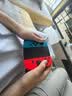 任天堂（Nintendo）【国内保税仓】Switch2/1代 OLED日版/港版游戏机续航加强版ns体感掌机便携家用主机 OLED港版红蓝64GB+马里奥奥德赛（保税仓） 实拍图