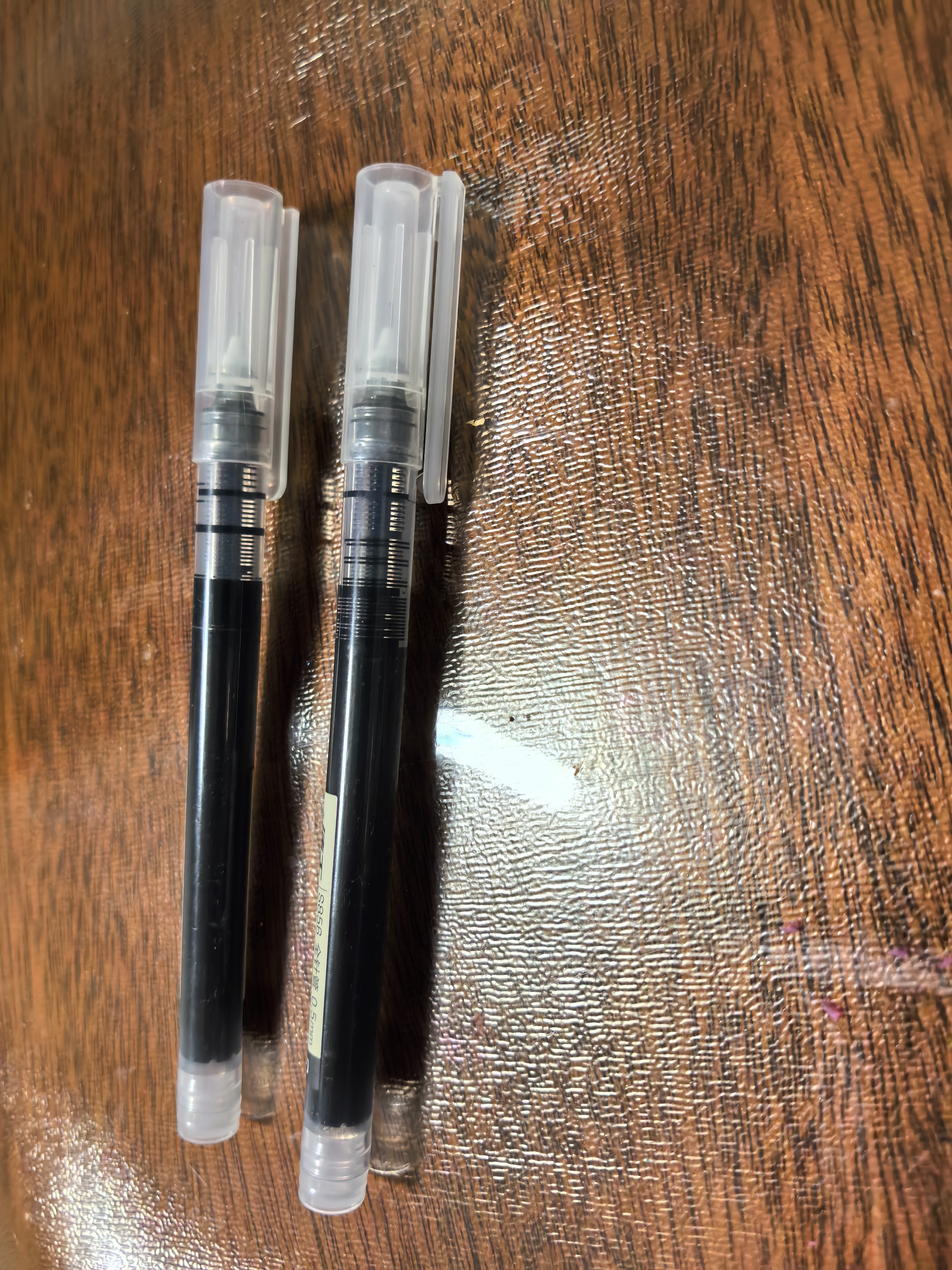 得力（deli）直液笔速干笔签字笔 0.5mm全针管中性笔 商务办公学生水笔走珠笔 黑色 12支/盒S856 实拍图