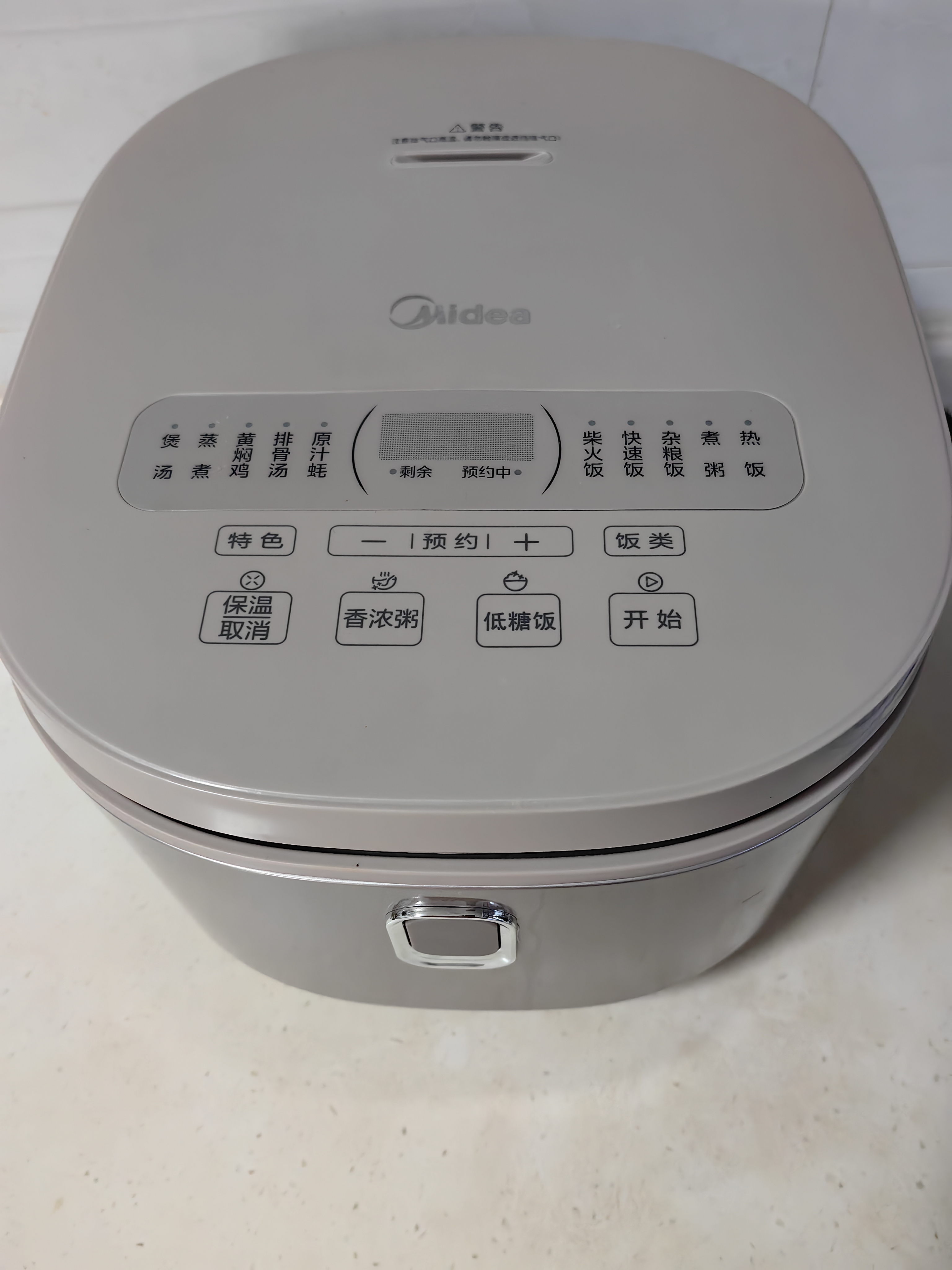 美的（Midea）低糖电饭煲 4升0涂层电饭锅家用智能米汤分离沥米饭煲316L不锈钢3-8人多功能微压蒸柴火饭锅4E62LS 实拍图