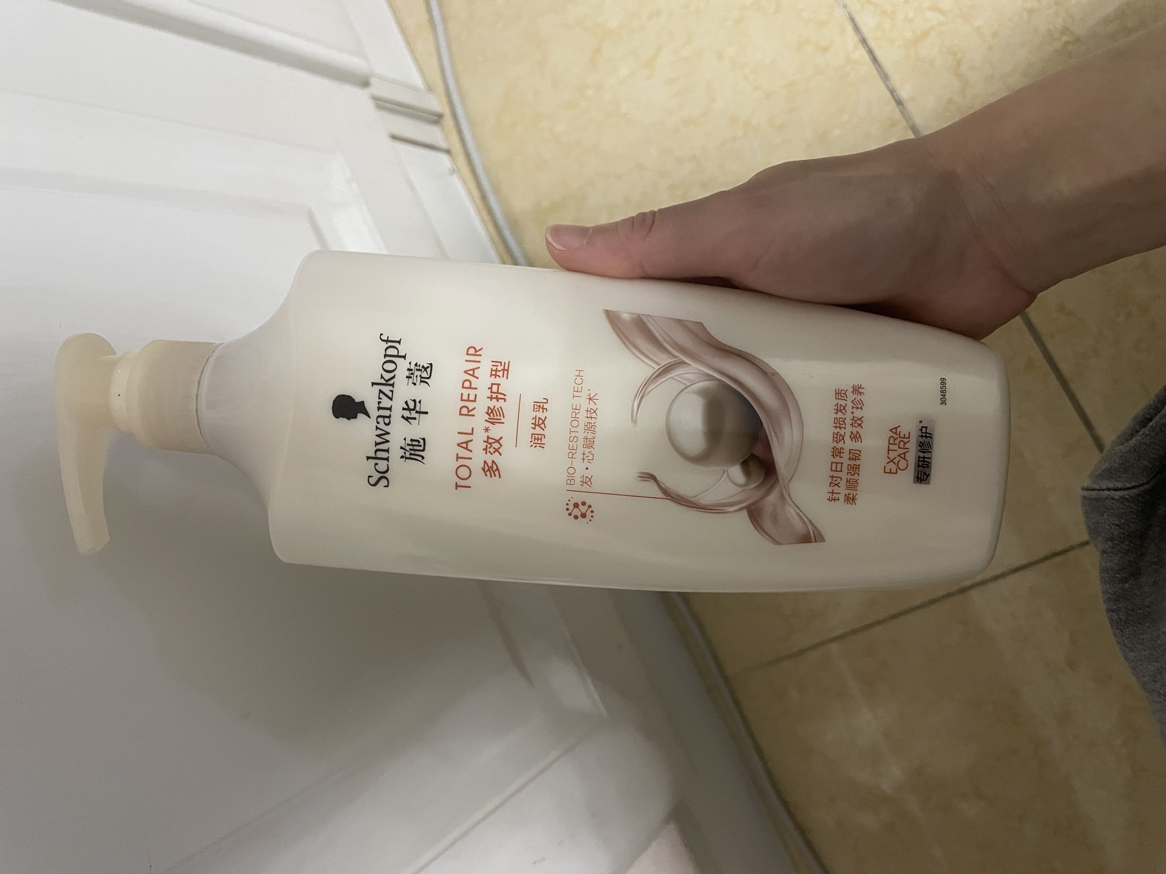 施华蔻（Schwarzkopf）羊绒脂滋养洗发水600ml(洗发水洗头膏 含乳木果油精华)(新老包装) 实拍图