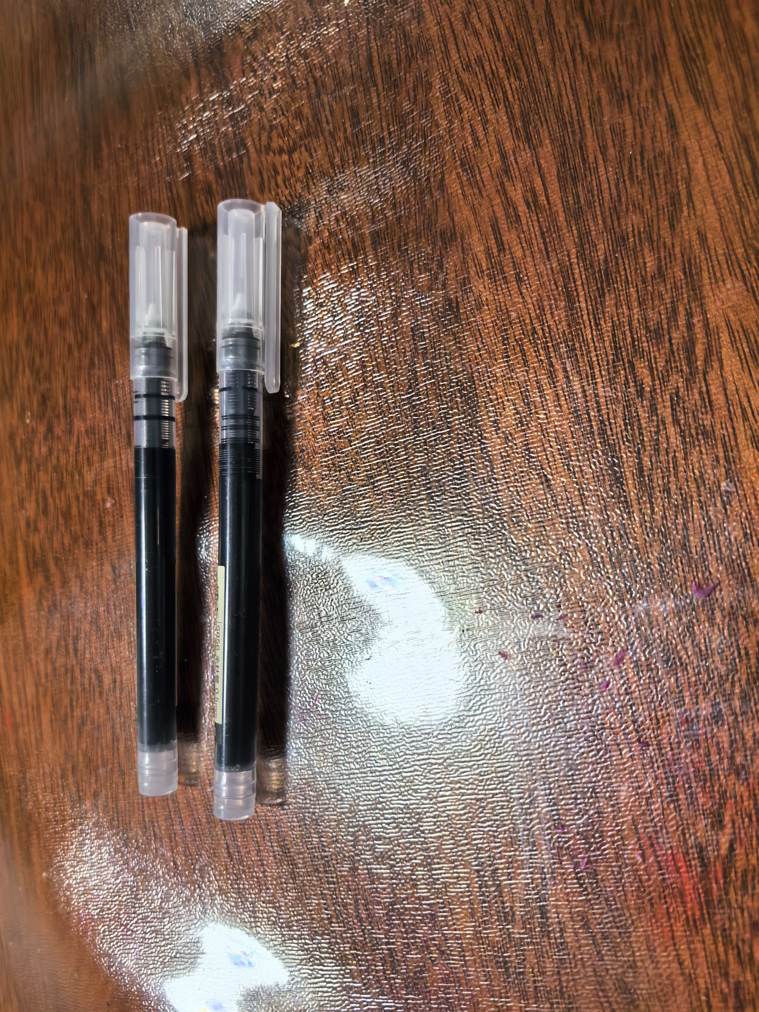 得力（deli）直液笔速干笔签字笔 0.5mm全针管中性笔 商务办公学生水笔走珠笔 黑色 12支/盒S856 实拍图