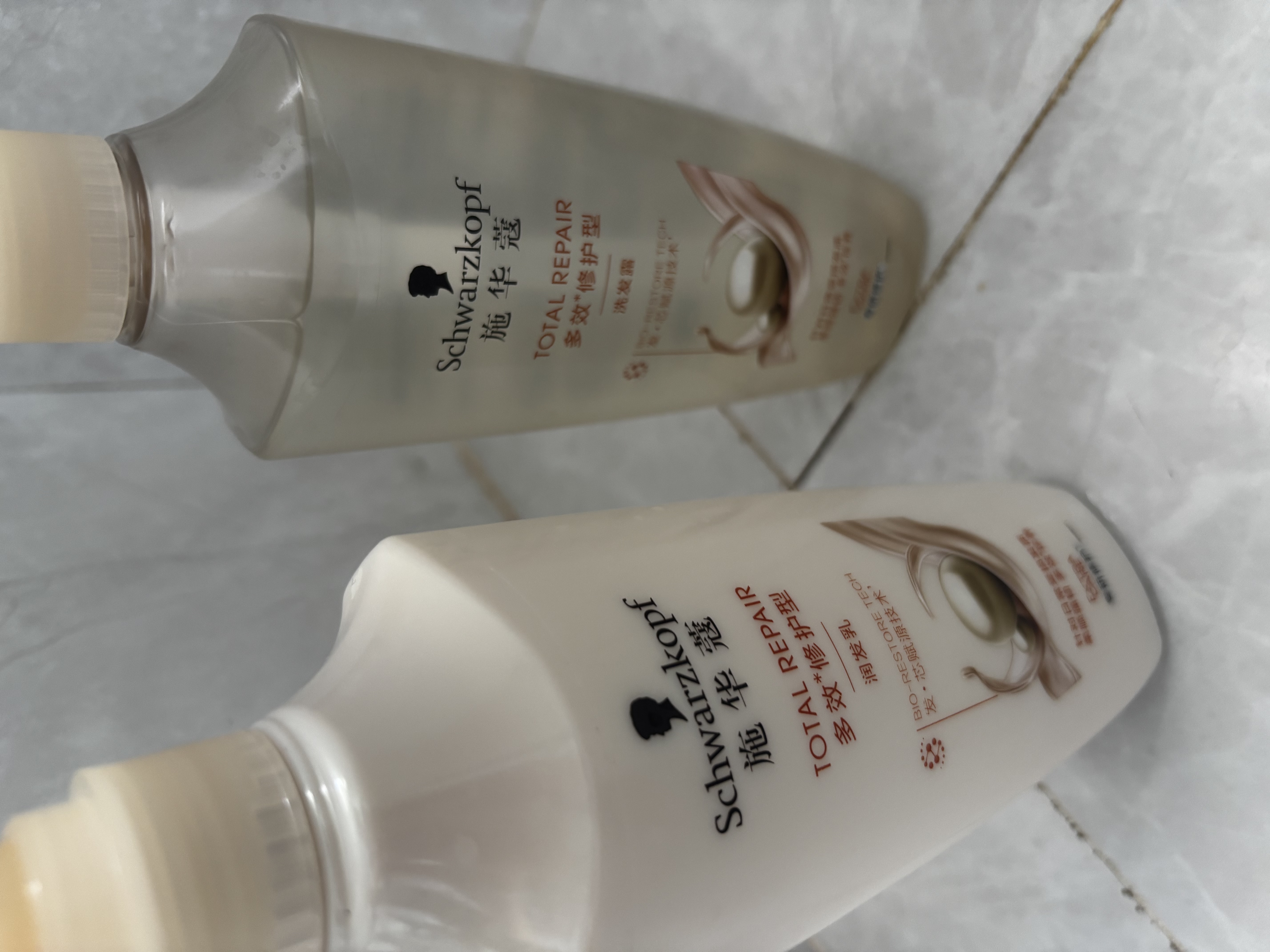 施华蔻（Schwarzkopf）新多效修护洗发水 损伤修护弱酸洗发露护发素 防毛躁柔顺男女通用 【超值养护装】洗400ml+润400ml 实拍图
