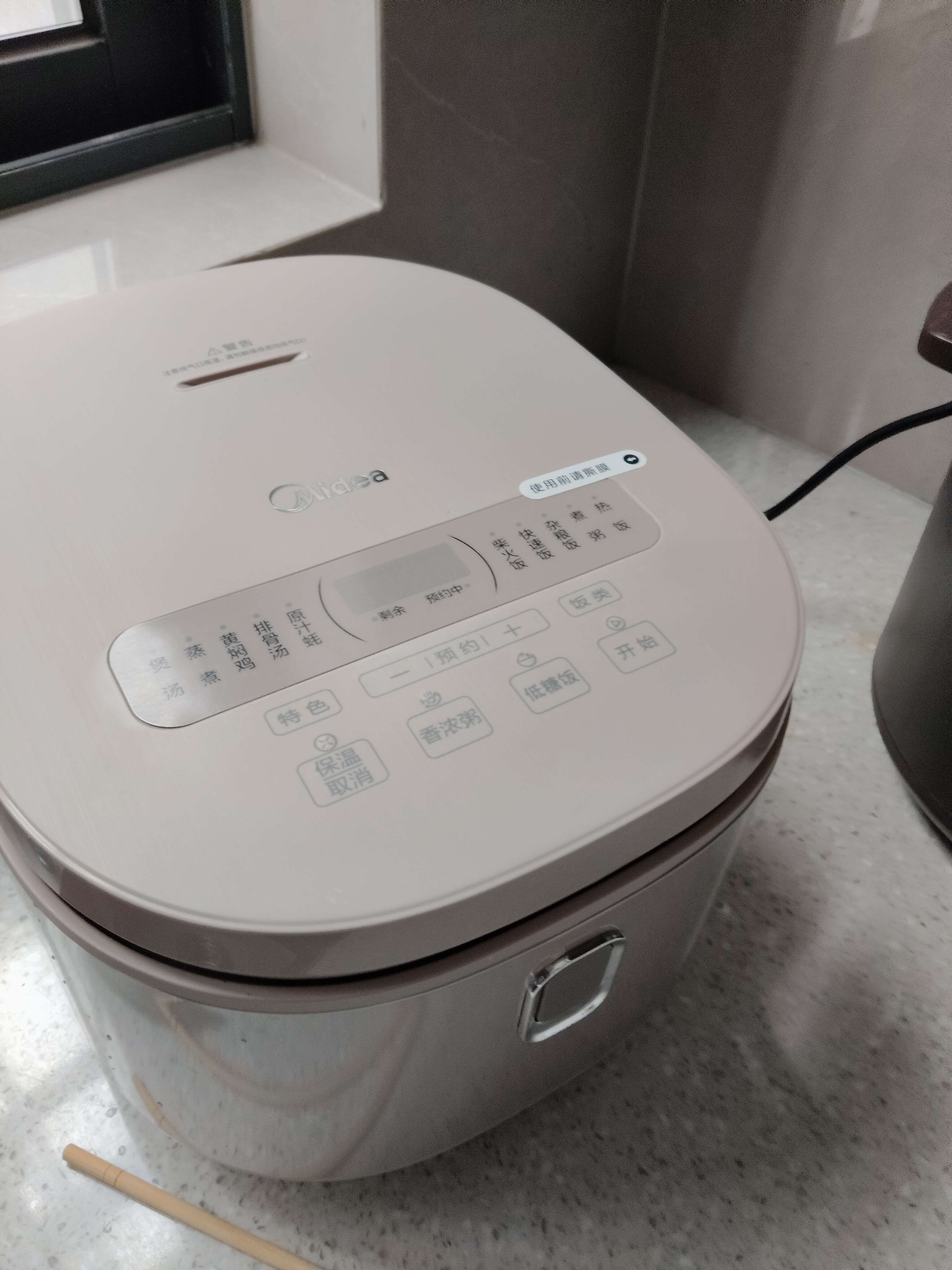 美的（Midea）低糖电饭煲 4升0涂层电饭锅家用智能米汤分离沥米饭煲316L不锈钢3-8人多功能微压蒸柴火饭锅4E62LS 实拍图