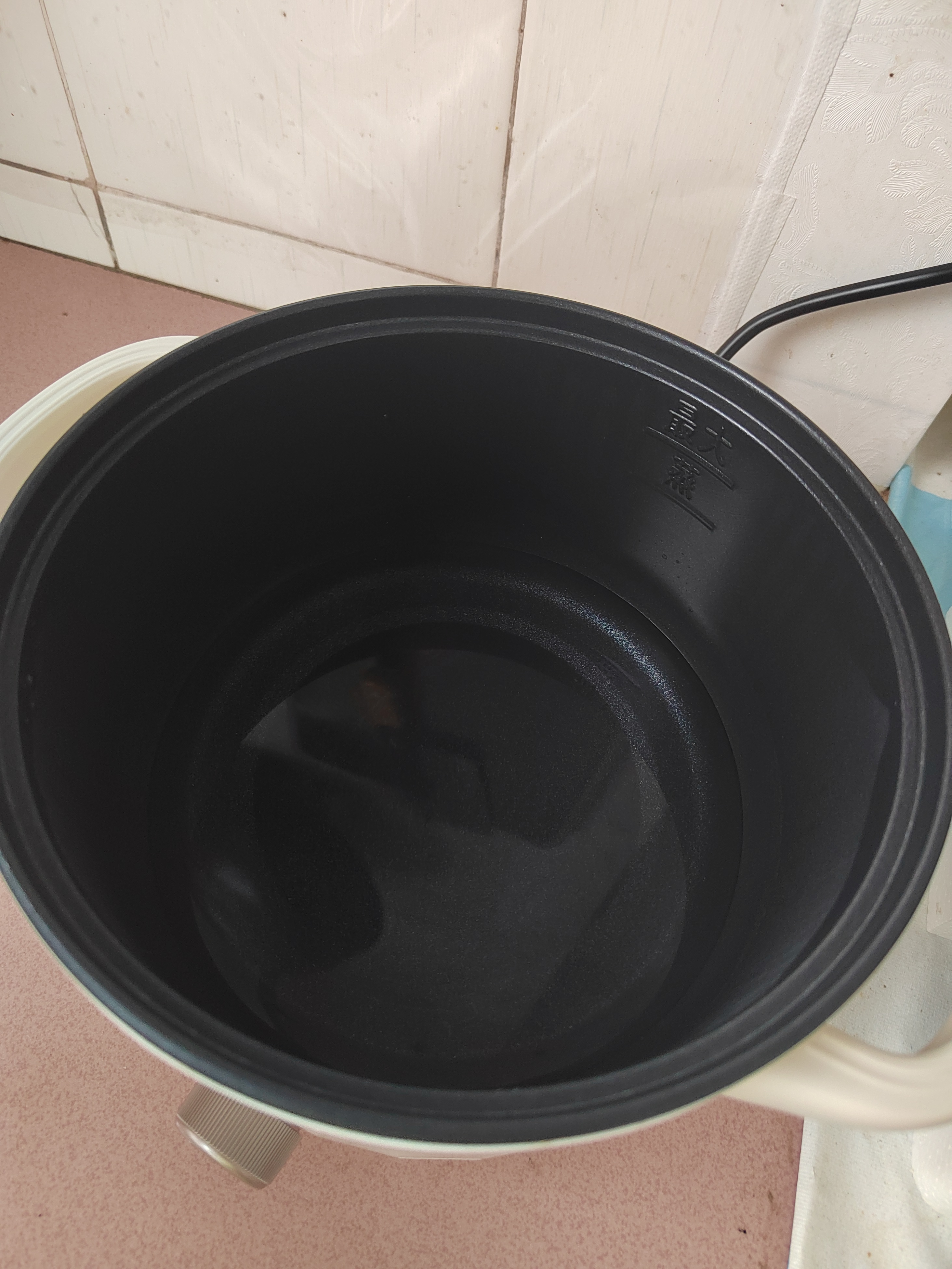 美的（Midea）电煮锅 泡面火锅宿舍小电锅 电蒸锅 多功能家用电热锅 2.6L蒸煮一体 小型2-3人用 配带蒸笼XZE2076 实拍图