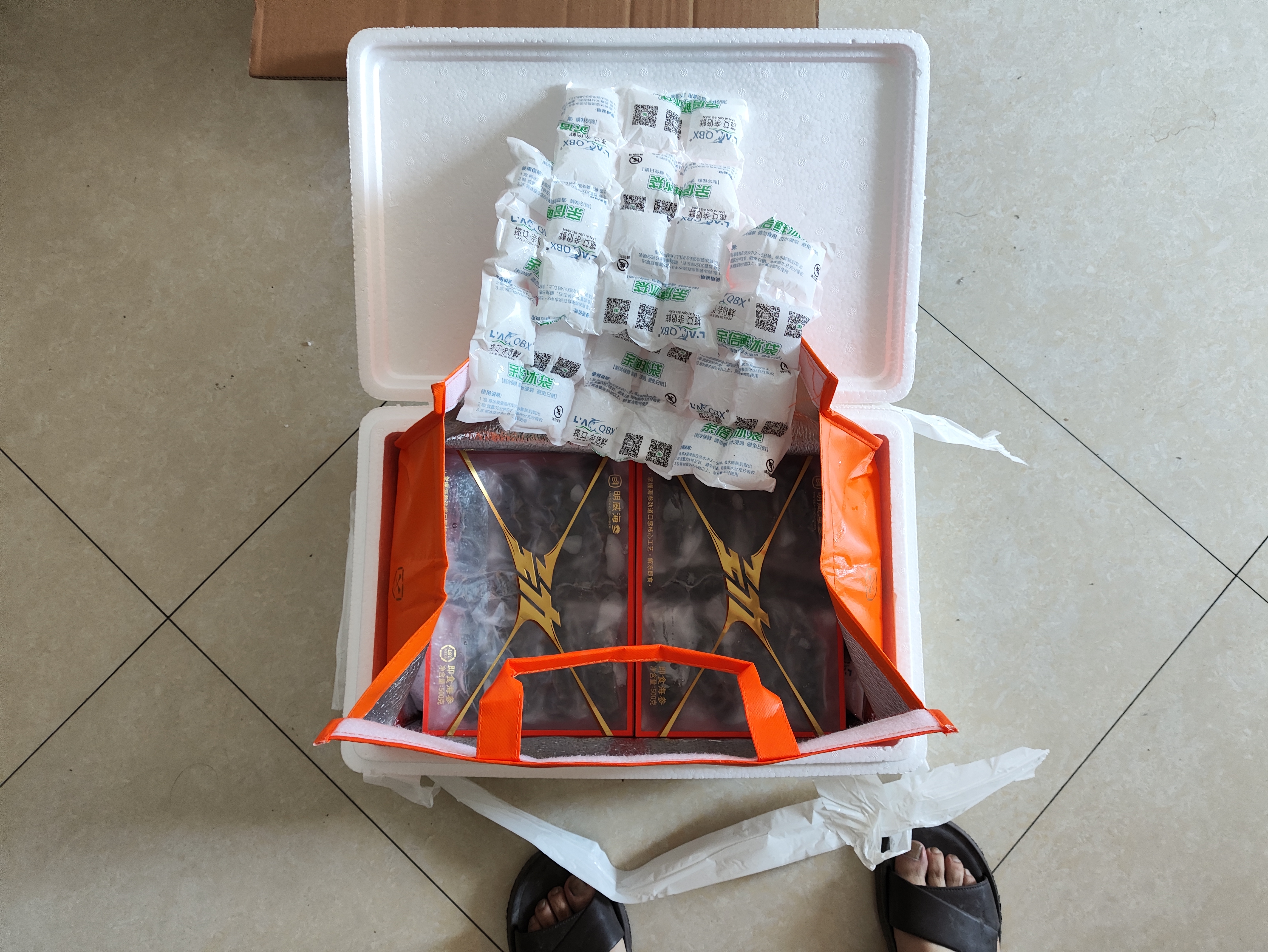 明威海参 鲜食即食海参刺参 鲜活加工独立包装单个装开袋即食冷冻海鲜礼盒 10-12头（1斤 ） 实拍图