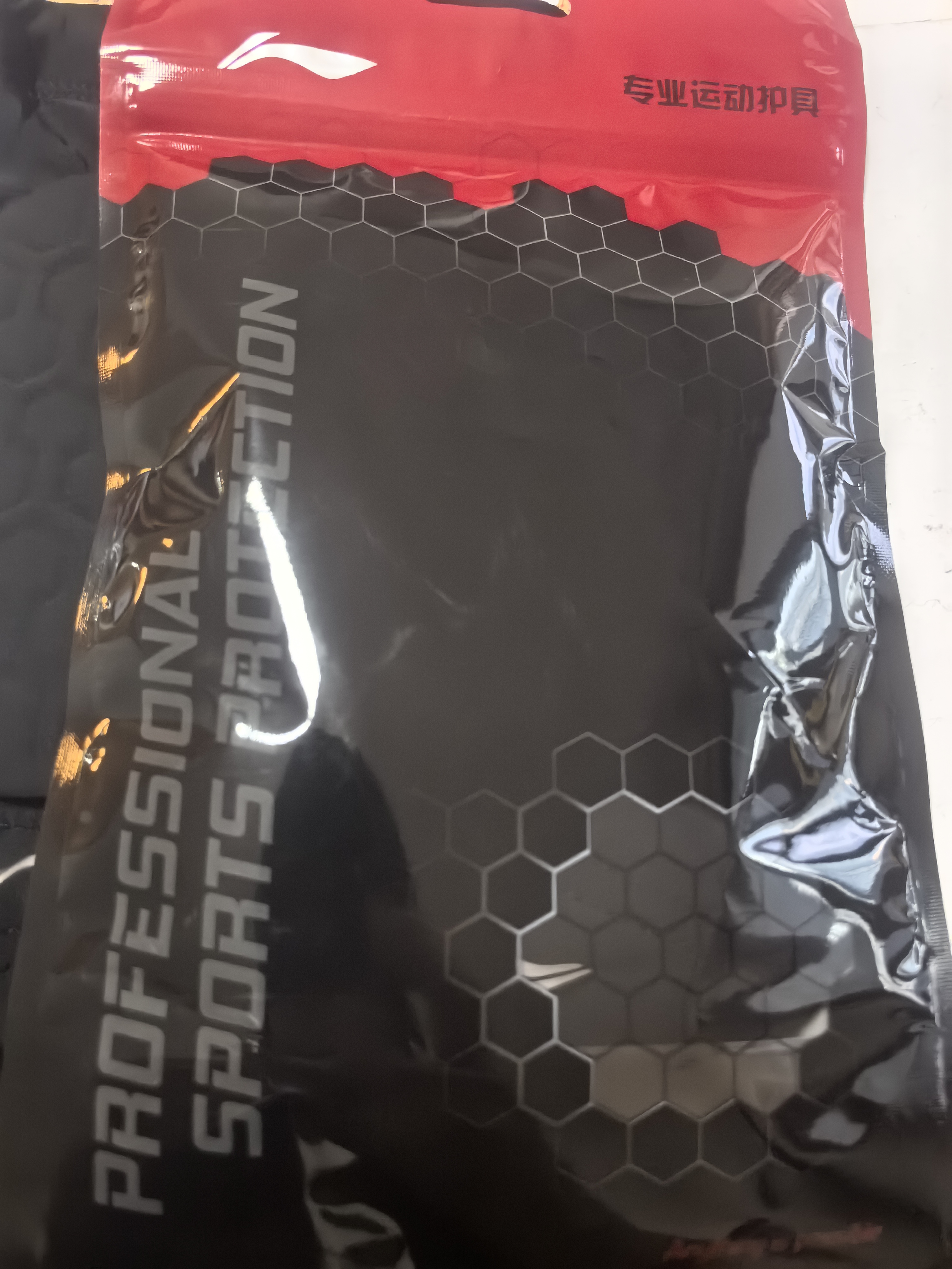 李宁（LI-NING）儿童护膝运动专业防护篮球蜂窝防撞专业膝盖护具髌骨跑步防摔护腿 实拍图