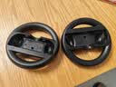 Nintendo SwitchSwitch原装joycon握把左右游戏手柄充电支架托架ns充电器oled配件 1代switch方向盘 实拍图