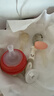 贝亲（Pigeon）防胀气 自然成长翻盖直饮吸管 大童奶瓶330ml 马戏团 18月+ AA279 实拍图