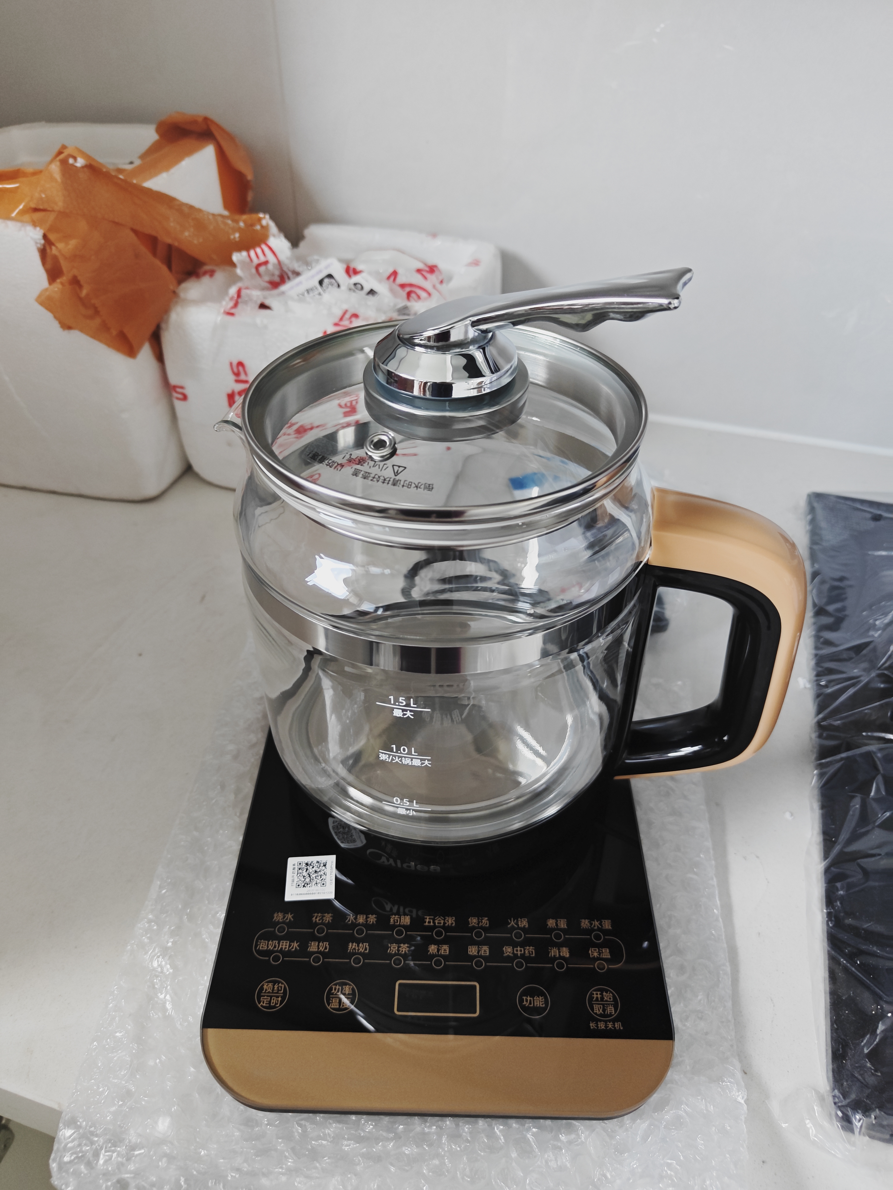 美的（Midea） 养生壶1.5L 高硼硅玻璃煮茶壶 智能预约保温电热水壶 大口径烧水壶电水壶 附带滤网 年货 【316L材质】GE1703Pro 1.5L 实拍图