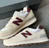 NEW BALANCE NB574官方休闲鞋女鞋复古舒适夏季透气网面礼物轻便百搭运动鞋 米白色 WL574RCF 38 (脚长24.5cm)尺码详询客服 实拍图